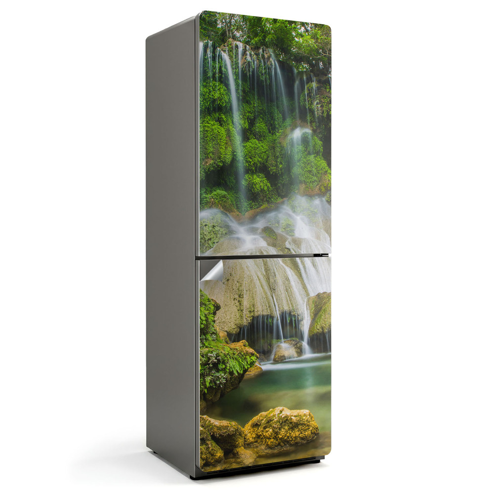 Folie pentru frigider O cascadă printre vegetație
